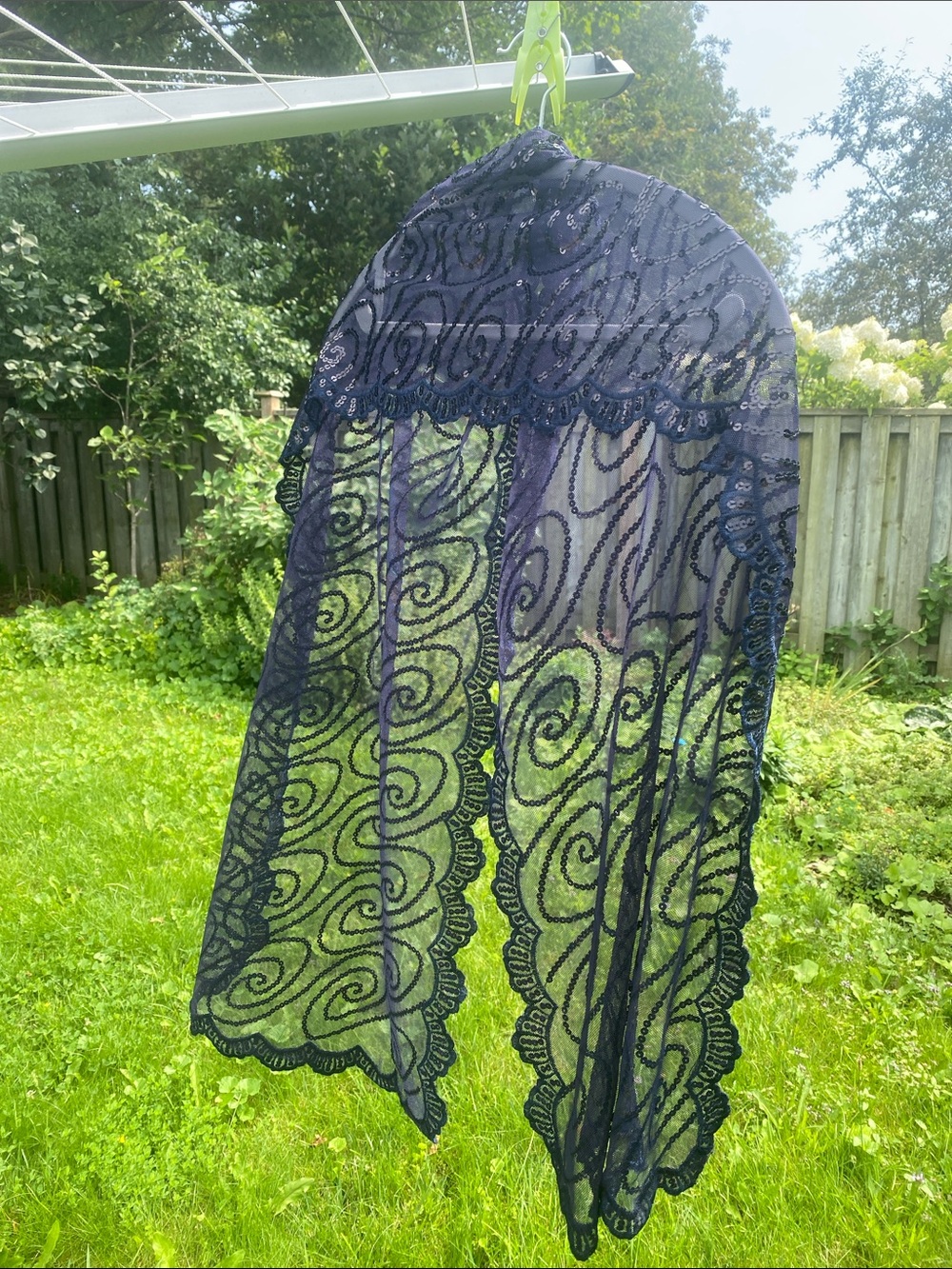 Navy scarf with sequins and scallop edges